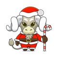 cute sheep Ã¢â¬â¹Ã¢â¬â¹wearing santa costume holding candy cane for christmas Royalty Free Stock Photo